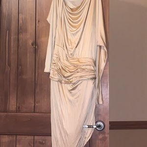 Knee length gold dress perfect for a special event